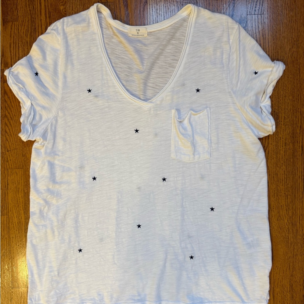 PILCRO Quinn Short Sleeve V-neck Tee from Anthropologie. White With Black Stars.